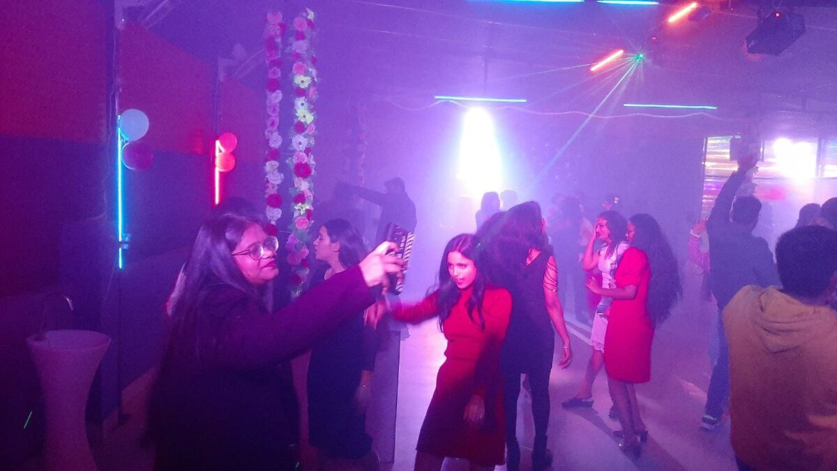 People dancing to bid farewell to the old year and welcome the new year.